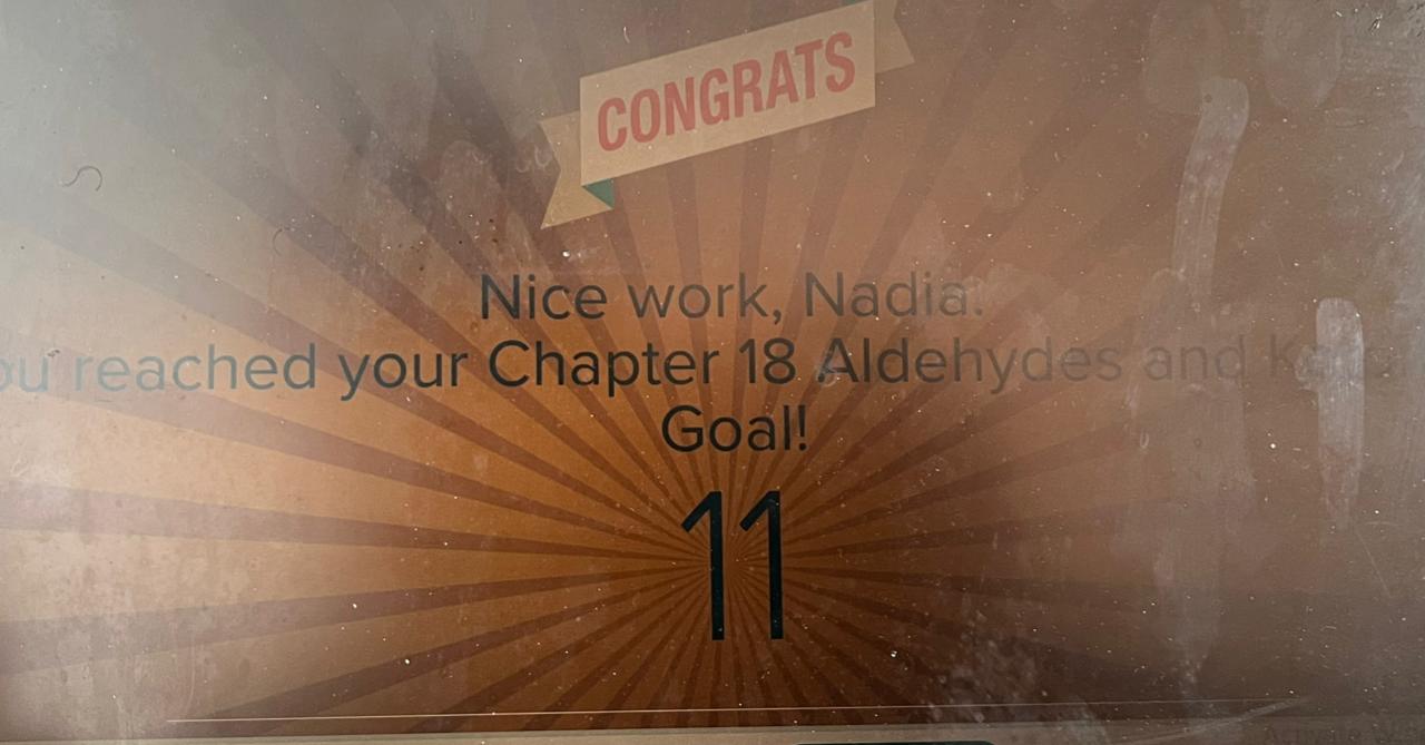 ALEKS Congrats screen — Nice work, Nadia. You reached your Chapter 18 Aldehydes and Ketones Goal! 11 topics.